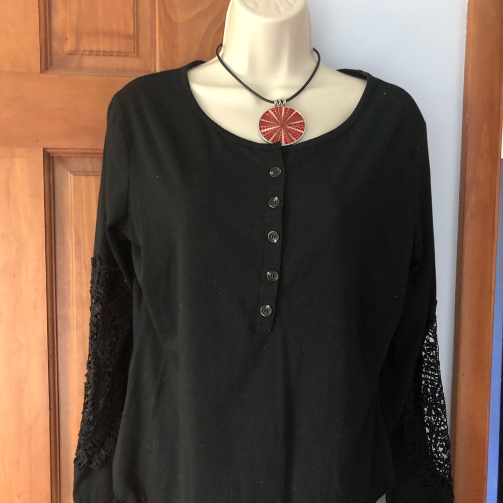 Black top with lattice cut sleeves